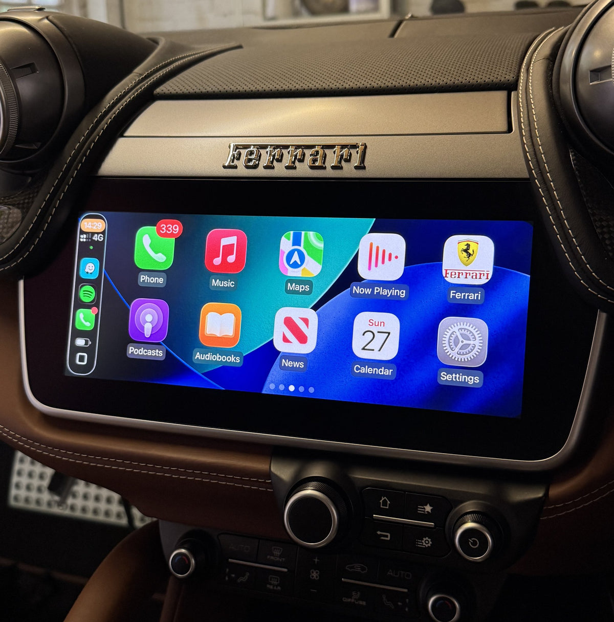 Apple CarPlay home screen on the factory display of a Ferrari Portofino